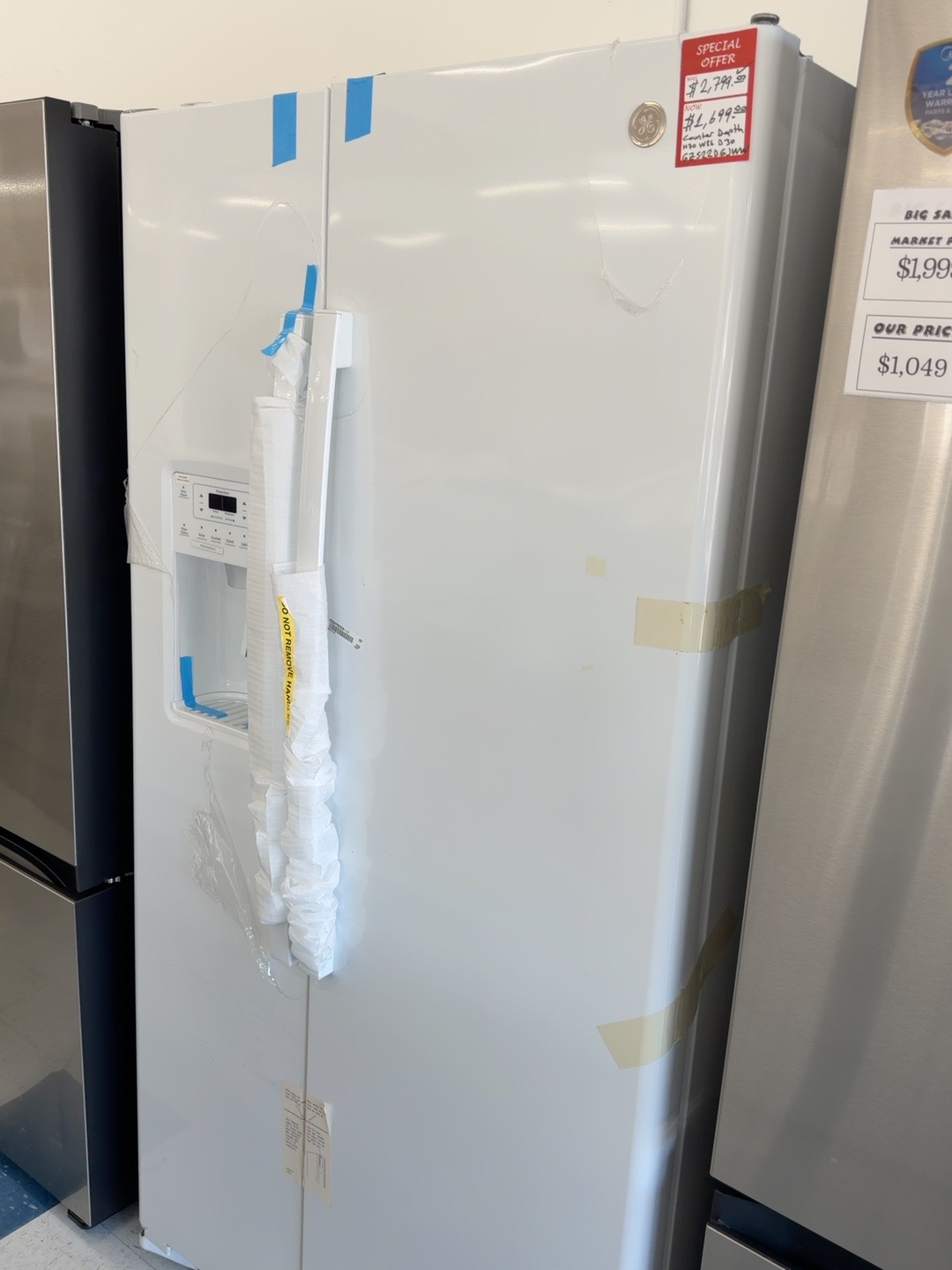 Actual GE GZS22DGJXFWW 21.9 Cu. Ft. Counter-Depth Side-By-Side Refrigerator in White in the MD Appliances showroom
